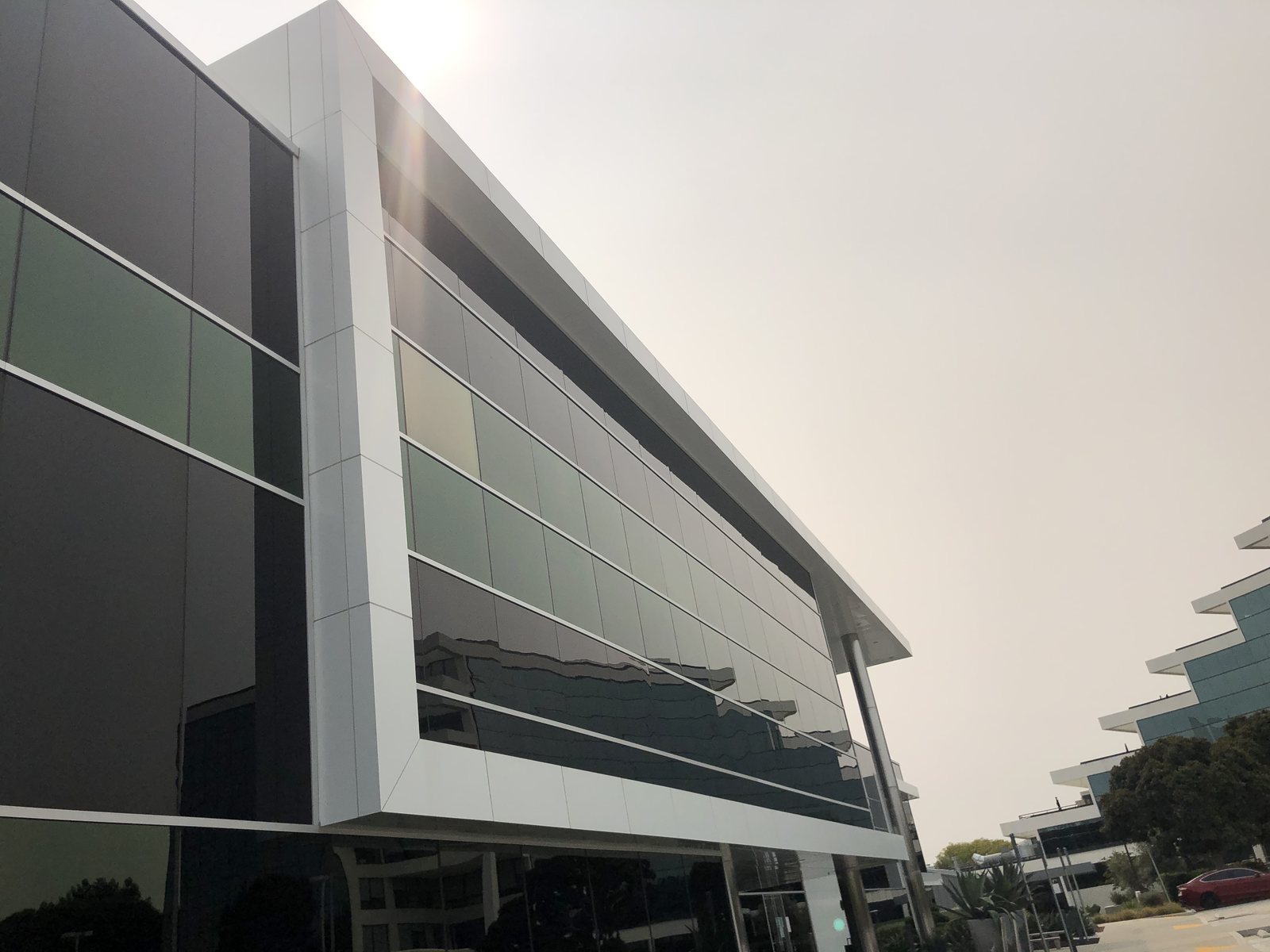 View smart glass exterior showing a failed IGU panel that did not tint alongside working panels